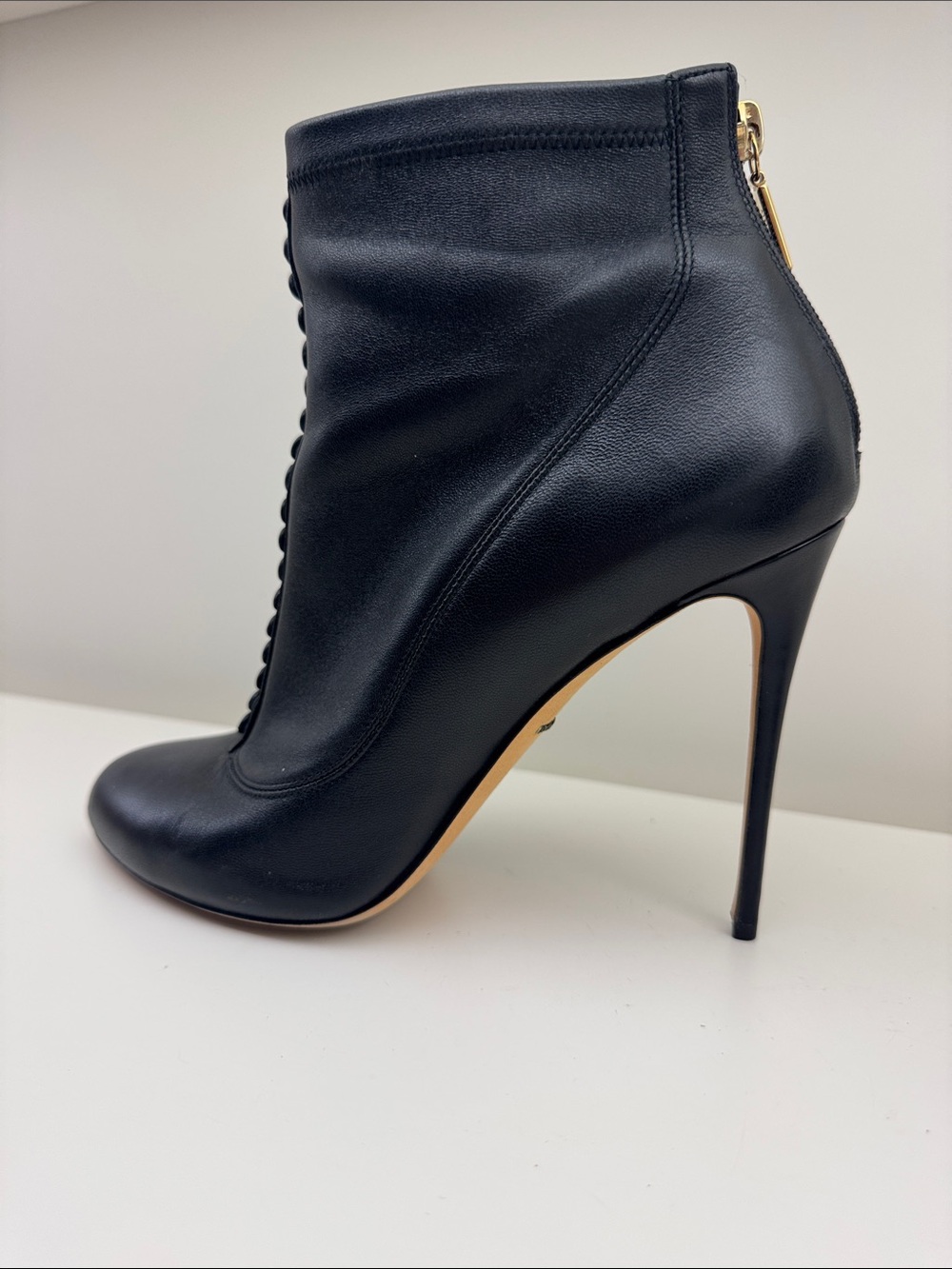 Dolce & Gabbana Black Leather Stiletto Ankle Boot with Gold Zip